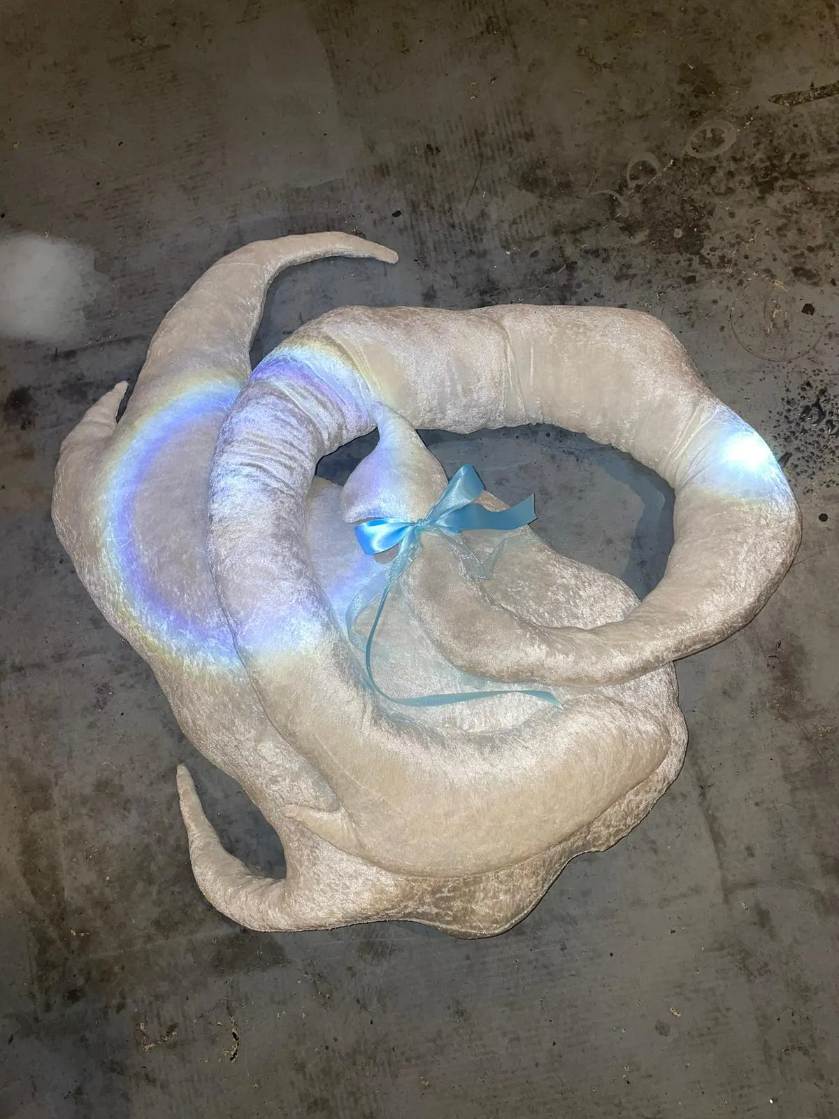 Large guardian creature sculpture in soft mint and grey tones designed for home comfort