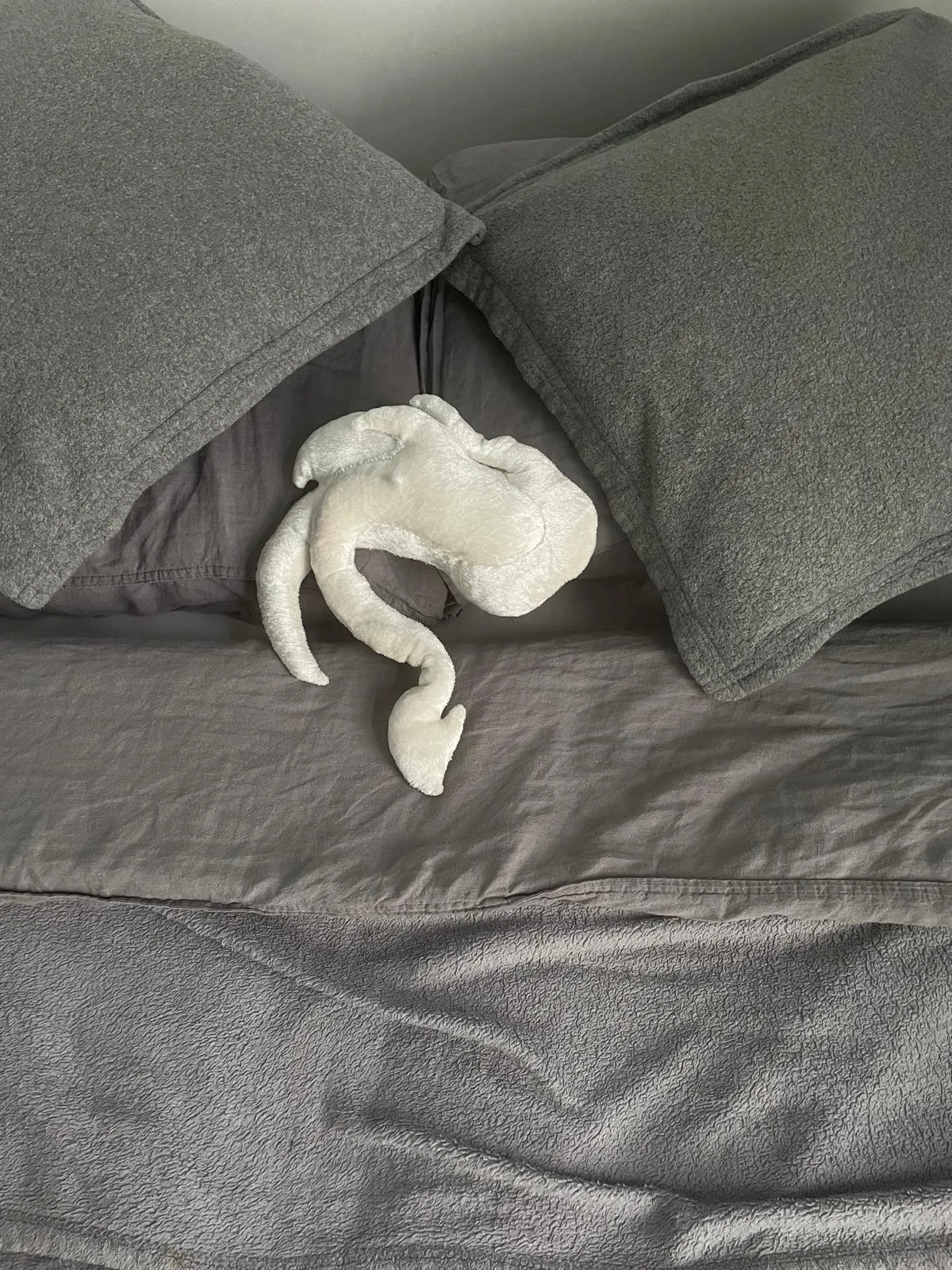Nubi creature displayed in bedroom setting, offering nighttime comfort